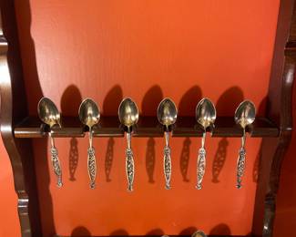 Sterling silver demitasse spoons, 80 grams, on spoon display rack