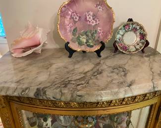 Antique Louis XVI style with marble top curio cabinet from the homeowner’s aunt in Baltimore