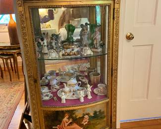 Antique Louis XVI style with marble top curio cabinet from the homeowner’s aunt in Baltimore
