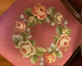Hand made needlepoint cushion made by homeowner’s great-aunt