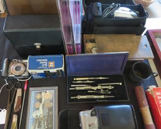 Binoculars, cameras, vintage drafting instruments
