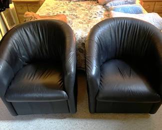 These two swivel chairs match and are in good condition.