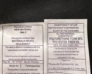These tags are for the black leather chair. Look carefully and you'll see the Thomasville name.
