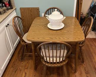 For a change of pace, here is another table and four matching chairs, with a nice tureen on top.