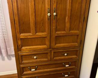 With a little different style, here is another armoire-style cabinet. From Thomasville.