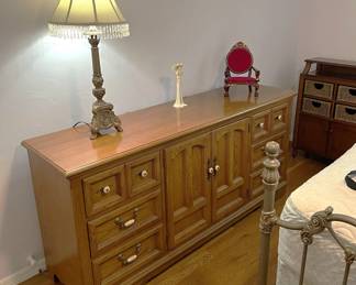 This long and low dresser is one of the Thomasville pieces. Don't forget about the lamp, or the miniature chair.