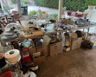 There are lots and lots of kitchen utensils and small appliances.