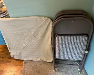 In case you want to play some cards, try these folding chairs and card table.