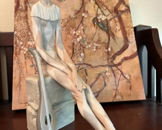 This is the lute-player Lladro figurine. Perhaps a French clown?