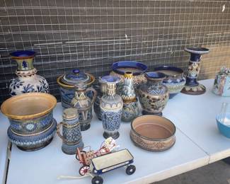 PRICE SLASH- Exquisitely crafted and rich in history, these Royal Doulton vases from 1800s England are true collector’s pieces. Known for their fine ceramic artistry and elegant detail, each vase features hand-painted motifs and some are adorned with sterling silver accents.