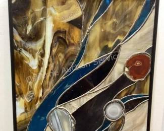 Stained glass with sliced polished agates
