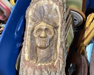 Carved Indian in log