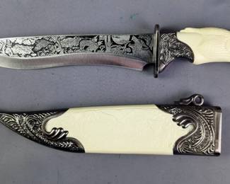 Fixed Blade Hunting Knife With Embossed Wolf Scene And High Relief Handle, 9.5" Blade, In Relief Scabbard
