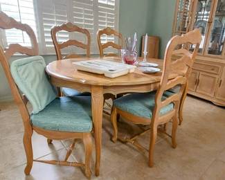 Dining room Table, 1 leaf not installed, 6 chairs.