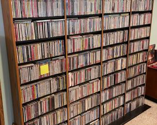 Thousands of DVDs and CDs . Many are brand new in the package.