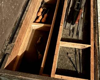 Chest full of marked carpentry tools