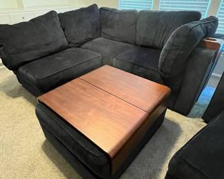 C19 - $3250. Lovesac "Sactional" Midnight Blue. 6 seat - 8 Side Modular Sectional in excellent condition. 1 Charge Side. Lovesac pillows and blankets included. Includes 2 tables & 3 cup holders. Each module measures 35" Wide x 29" Deep seats Measure 35" x 35". (This retails for over 6k)