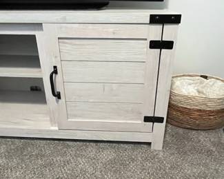 C20 - $65. Cream color Shaker TV Stand in great shape. Measures 60" Wide x 28" Deep x 30.5" Tall.