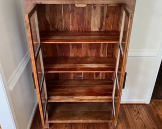 C1 - $750. Pottery Barn Reed Storage Cabinet, in excellent condition. (This still retails for $1400.) Measures 39" Wide x 17" Deep x 64" Tall. https://www.potterybarn.com/products/reed-bar-cabinet/