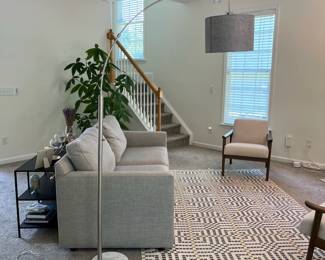 C12 - $65. Arc Lamp with Marble Base Measures 76" Tall, base 11" Round. This unique lamp is in great condition.