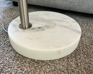 C12 - $65. Arc Lamp with Marble Base Measures 76" Tall, base 11" Round. This unique lamp is in great condition.
