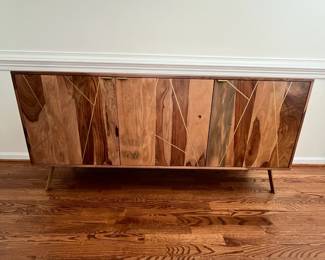 C3 - $275. Home Decorators Collection from Home Depot. Buffet Table with gold metal inlay. (Purchases for $700.) This is in excellent condition. Measures 63" Wide x 16" Deep x 29.75" Tall