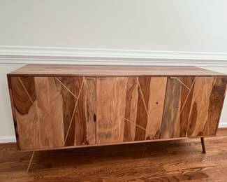 C3 - $275. Home Decorators Collection from Home Depot. Buffet Table with gold metal inlay. (Purchases for $700.) This is in excellent condition. Measures 63" Wide x 16" Deep x 29.75" Tall