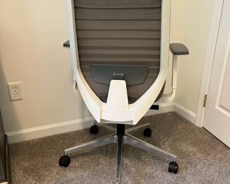 C17 - $200. West Elm Branch Ergonomic Chair. Adjustable. White Framed with "Pebble" Fabric.