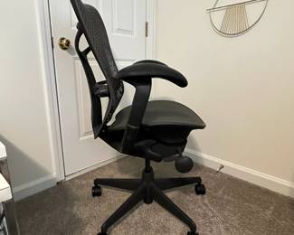 C22 - $275. Herman Miller Mirra 2 Adjustable Desk Chair. Measures 28" Across