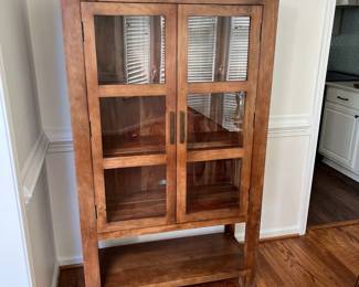 C1 - $750. Pottery Barn Reed Storage Cabinet, in excellent condition. (This still retails for $1400.) Measures 39" Wide x 17" Deep x 64" Tall. https://www.potterybarn.com/products/reed-bar-cabinet/