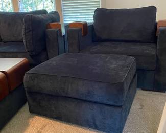 C19 - $3250. Lovesac "Sactional" Midnight Blue. 6 seat - 8 Side Modular Sectional in excellent condition. 1 Charge Side. Lovesac pillows and blankets included. Includes 2 tables & 3 cup holders. Each module measures 35" Wide x 29" Deep seats Measure 35" x 35". (This retails for over 6k)