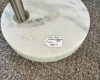 C12 - $65. Arc Lamp with Marble Base Measures 76" Tall, base 11" Round. This unique lamp is in great condition.