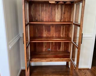 C1 - $750. Pottery Barn Reed Storage Cabinet, in excellent condition. (This still retails for $1400.) Measures 39" Wide x 17" Deep x 64" Tall. https://www.potterybarn.com/products/reed-bar-cabinet/