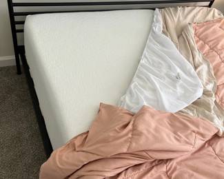 C25 - $250. Queen, Black Metal Framed Bed. In good condition. From Ashley Furniture. Clean Queen Mattress included if you want it! 2021 Mattress - very gently used.