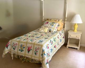 Antique white twin bed with nightstand