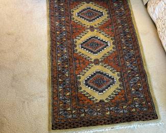 D6 - $65. Beautiful wool rug. Diamonds and edges are more of a sage green in person. 32"x54".
