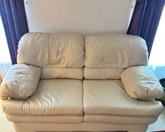 D3 - $450 SET. Ivory Leather couch 85"36"34" and loveseat 65"x33"x37". Good condition. No rips or holes.