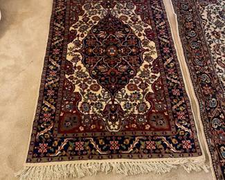 D9 - $65. Vibrant wool rug. 36"x62".