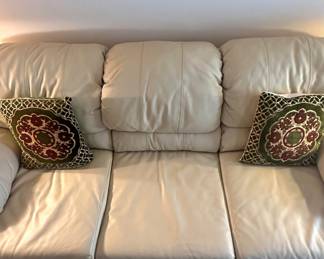 D3 - $450 SET. Ivory Leather couch 85"36"34" and loveseat 65"x33"x37". Good condition. No rips or holes.