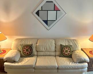 D3 - $450 SET. Ivory Leather couch 85"36"34" and loveseat 65"x33"x37". Good condition. No rips or holes.