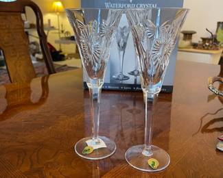 D22 - $25. Pair of Waterford toasting flutes. New in box. 9.5" tall.