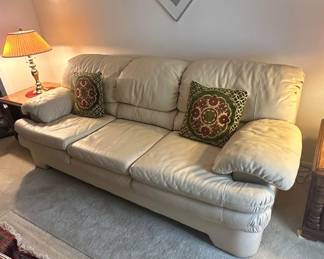 D3 - $450 SET. Ivory Leather couch 85"36"34" and loveseat 65"x33"x37". Good condition. No rips or holes.