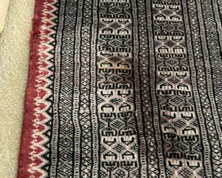 D4 - $95. Stunning wool rug. Some fraying on the edge and stain-pictured. 72"x110".
