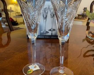 D22 - $25. Pair of Waterford toasting flutes. New in box. 9.5" tall.