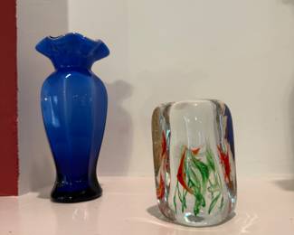 Glass etc on the mantel cased glass empoli type vase and fish paperweight.