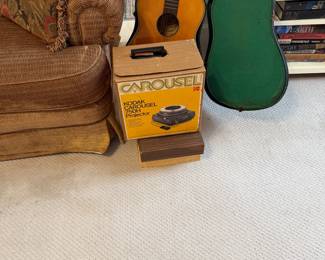 Guitar, slide projector and carousels