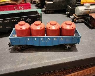 Lionel 6042 Blue Gondola with 4 red canisters - $15.00