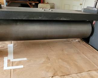 Roller on etching press