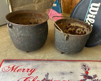 old iron cauldrons