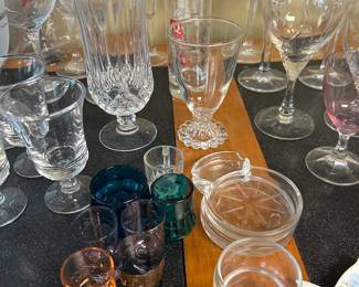 small shot glasses and vintage glass coaster ashtrays